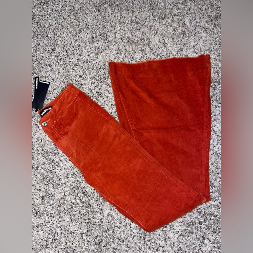 Super flare corduroy pants. Brand new. Never been worn!